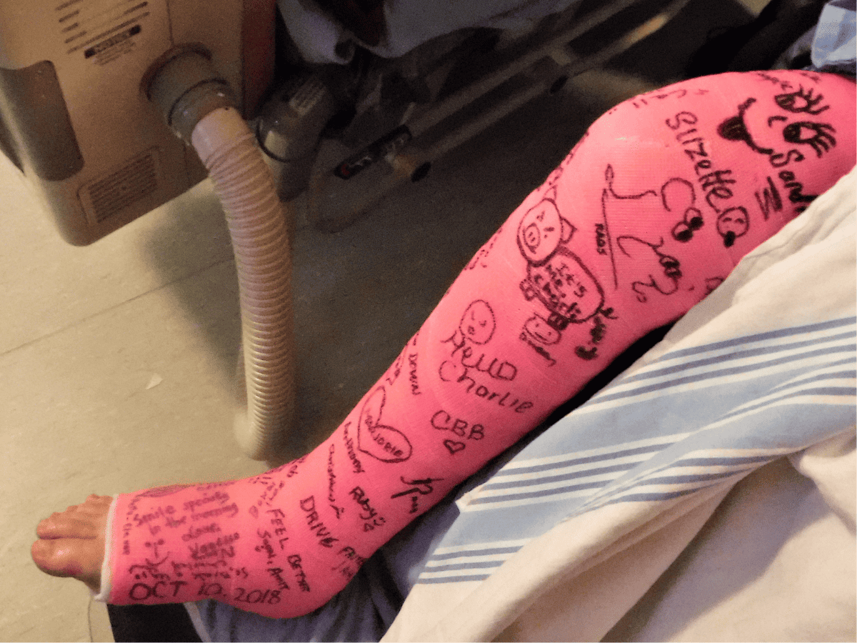 pink cast with drawings and signatures