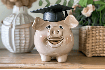 piggy bank with graduation cap