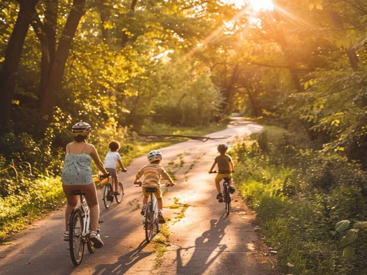 mom biking with her kids after work